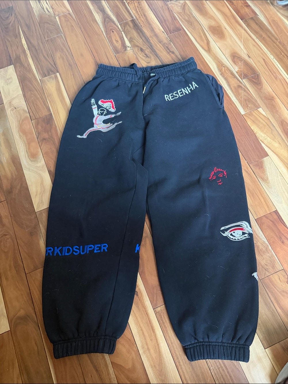 Kidsuper Black Graphic Jogger Sweatpants with Embroidered Accents